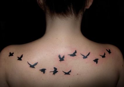 Bird Flying Back Tattoo