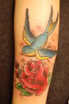 rose and flying bird tattoo