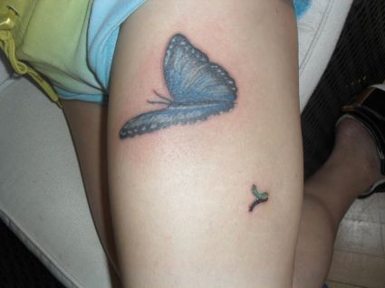 Worm And Butterfly Cover Up Tattoo
