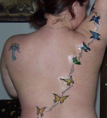 Butterflies Pic Tattoo On Back