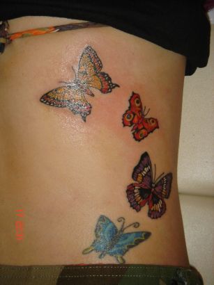 Butterflies Pic Tattoo On Side Back