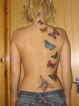 Butterflies Tattoos On Back Of Girl