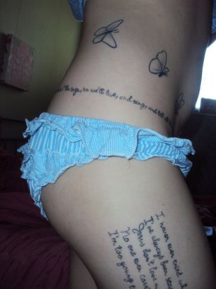 Butterfly And Text Tattoo On Thigh And Stomach