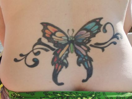 Butterfly Image Tattoos On Lower Back Of Women