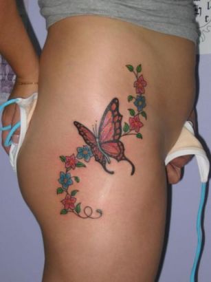 Flowers And Butterfly Image Tattoo On Hip