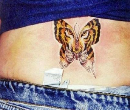 Leo Butterfly Image Tattoo On Lower Back