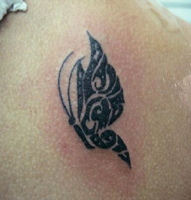 Tribal Butterfly Picture Tattoo On Back