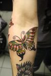 butterflies image tattoo on arm