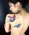 butterflies image tattoo on back