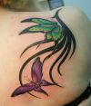 butterflies pic tattoo on right shoulder blade
