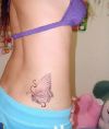 butterfly pic of tattoos on upper hip