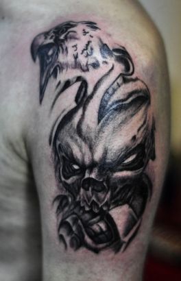 Eagle And Skull Tattoo On Left Arm