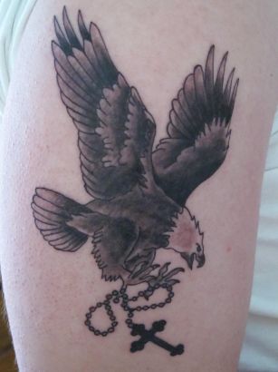 Flying Eagle With Cross Amulet Tattoo 