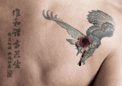 Wounded Eagle Back Tattoo