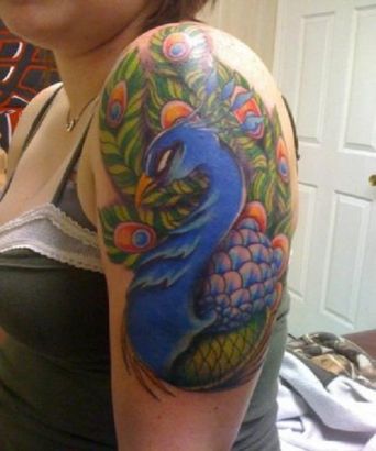 Peacock Tattoo On Left Arm