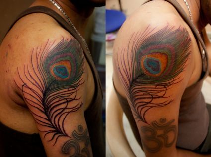 Peacock Feather And Om Symbol Tattoo