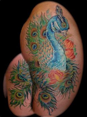 Peacock Tattoos On Back Of Girl