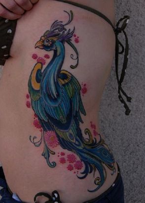 Peacock Images Tattoo On Rib