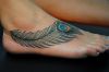 peacock feather tattoo on feet