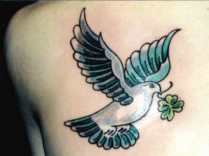 Dove With Flower Pic Tattoo On Back