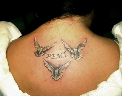 Doves Tattoo On Girl's Back