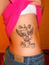 dove tats on rib