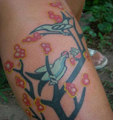 Bird And Cherry Blossom Branch Pic Tattoo On Leg