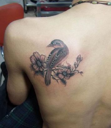 Bird And Flower Pic Tattoo On Back