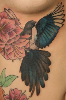 Bird And Flowers Pic Tattoo On Rib 