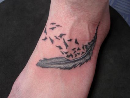 Feather And Flying Bird Pic Tattoo On Feet