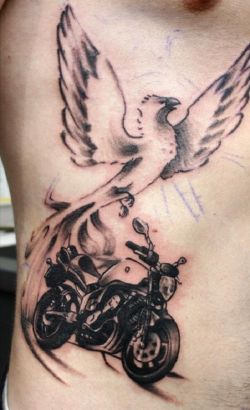 Phoenix And Bike Pic Tattoo On Rib