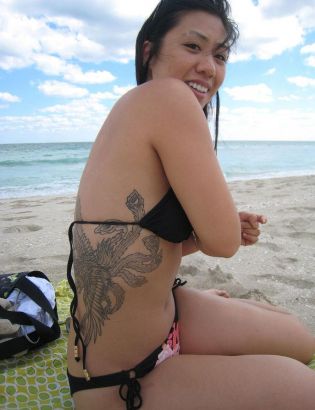 itattooz-phoenix-image-tattooon-rib-of-sexy-girl
