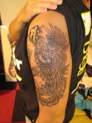 Phoenix Image Tattoos On Arm