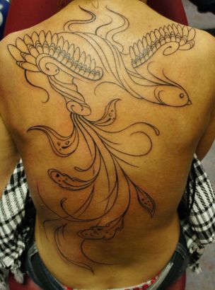 Phoenix Pic Tattoos On Back Of Man