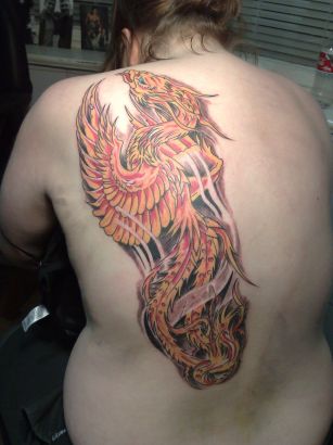 Phoenix Tats On Girl's Back 