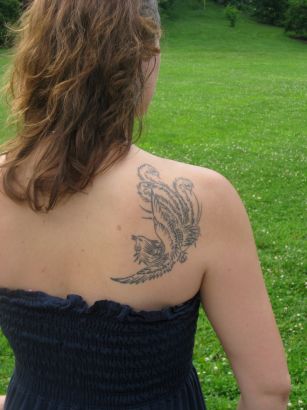 Girl With Phoenix Tattoo