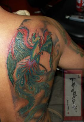 Tats Of Phoenix On Side Back