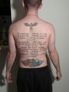 phoenix and text tattoo on back