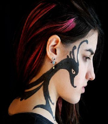 Swan Tattoo On Face And Neck