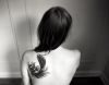 swan feather tattoo