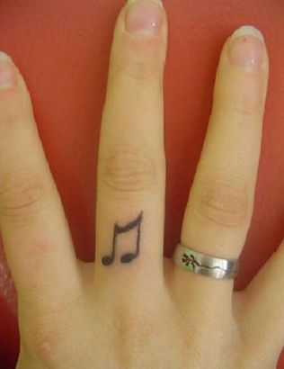 itattooz music symbol tattoo on finger