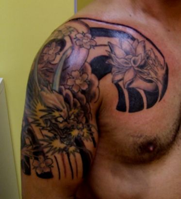 Dragon With Lotus Flower Tattoo Design || Tattoo from Itattooz