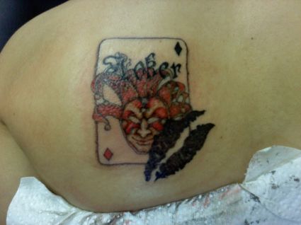 Card Joker Tattoo On Girl's Back