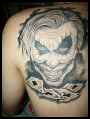Joker Face And Card Tattoo