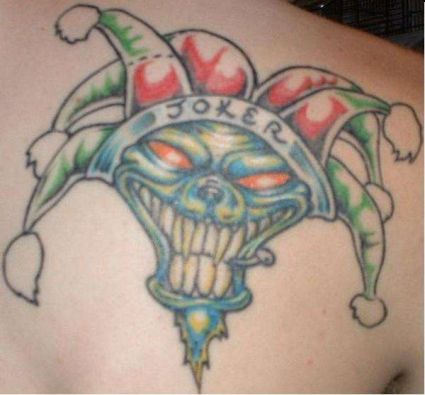 Joker Face Tattoo On Man's Back