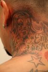 lady joker neck tattoo