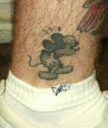 Micky Mouse Tattoo On Leg