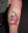 micky mouse tattoo on calf