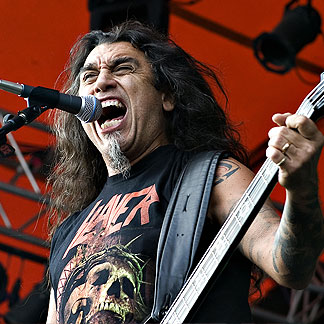 Tom Araya Left Arm Tribal Tattoo Design