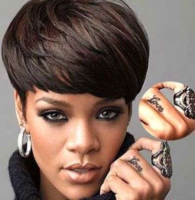 Rihanna  "Love" Left Middle Finger Tattoo 